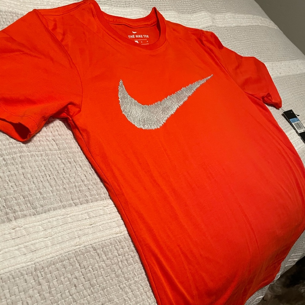 Orange Nike shirt